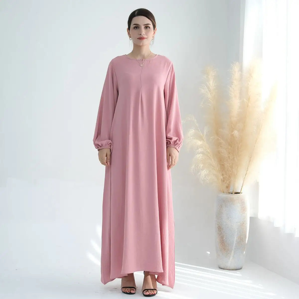 عباية نسائية مسلمة بأكمام طويلة