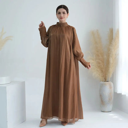 عباءة نسائية مسلمة براقة