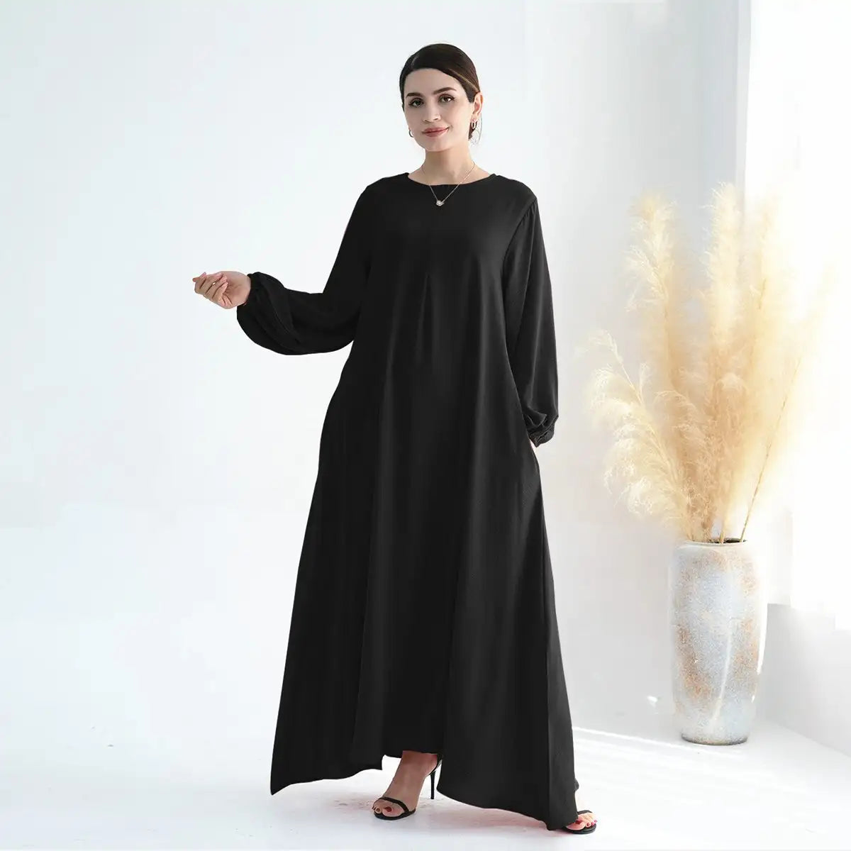 عباية نسائية مسلمة بأكمام طويلة