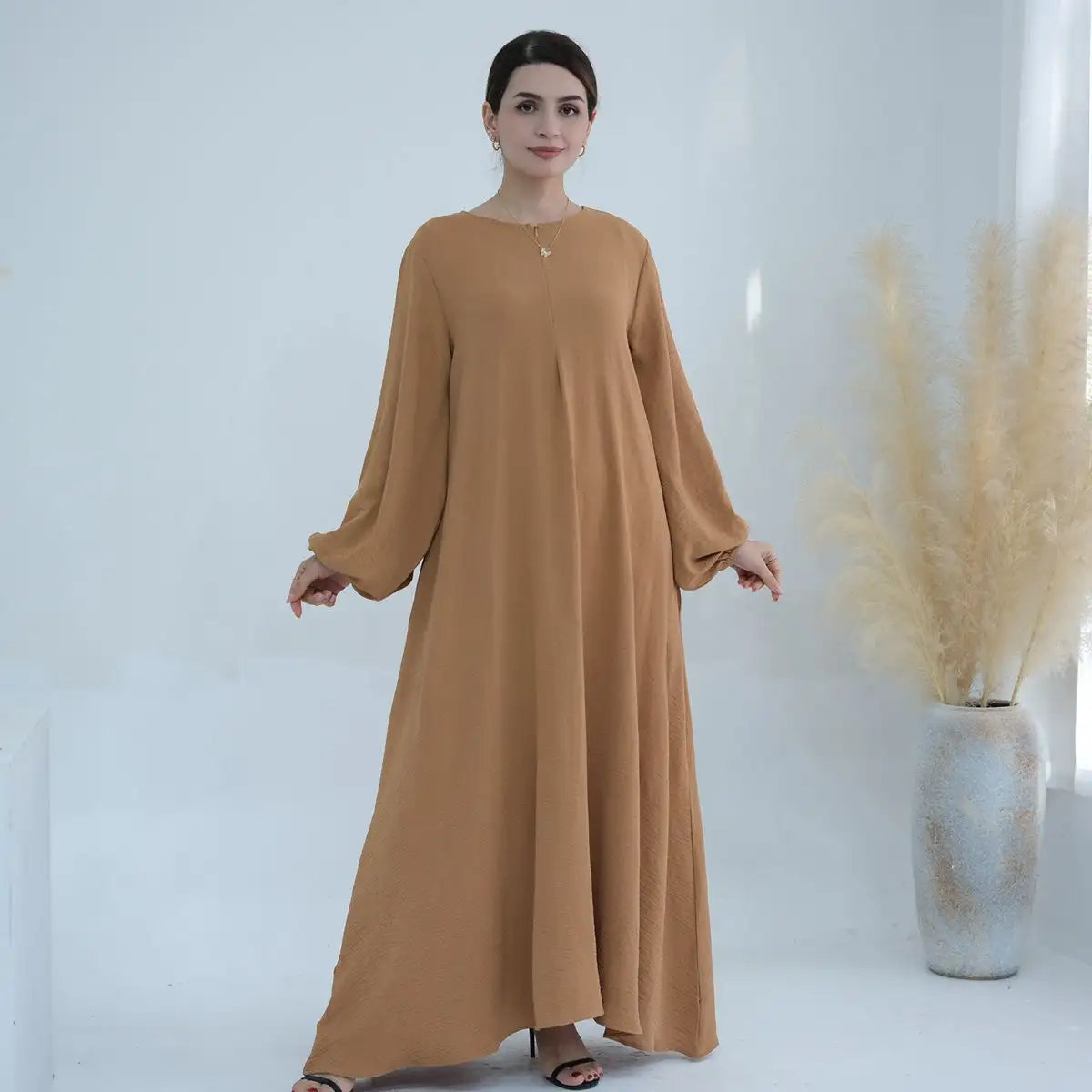 عباية نسائية مسلمة بأكمام طويلة