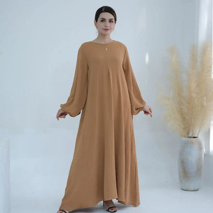 عباية نسائية مسلمة بأكمام طويلة